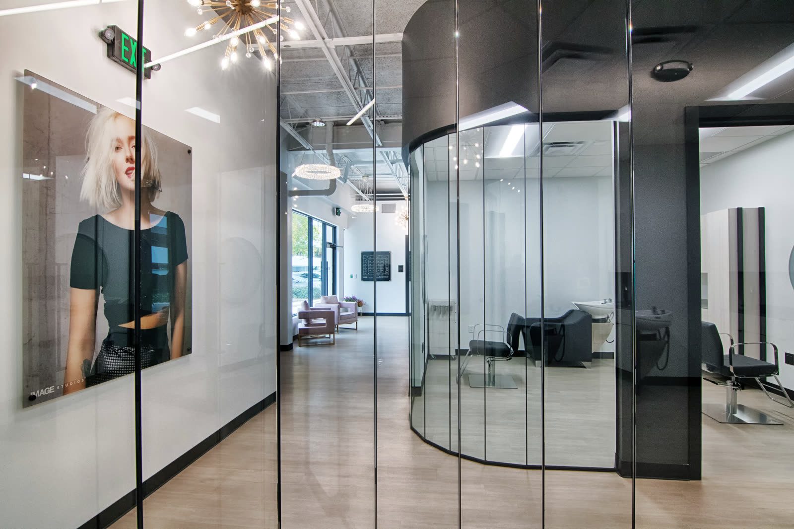 Chic salon space featuring large poster