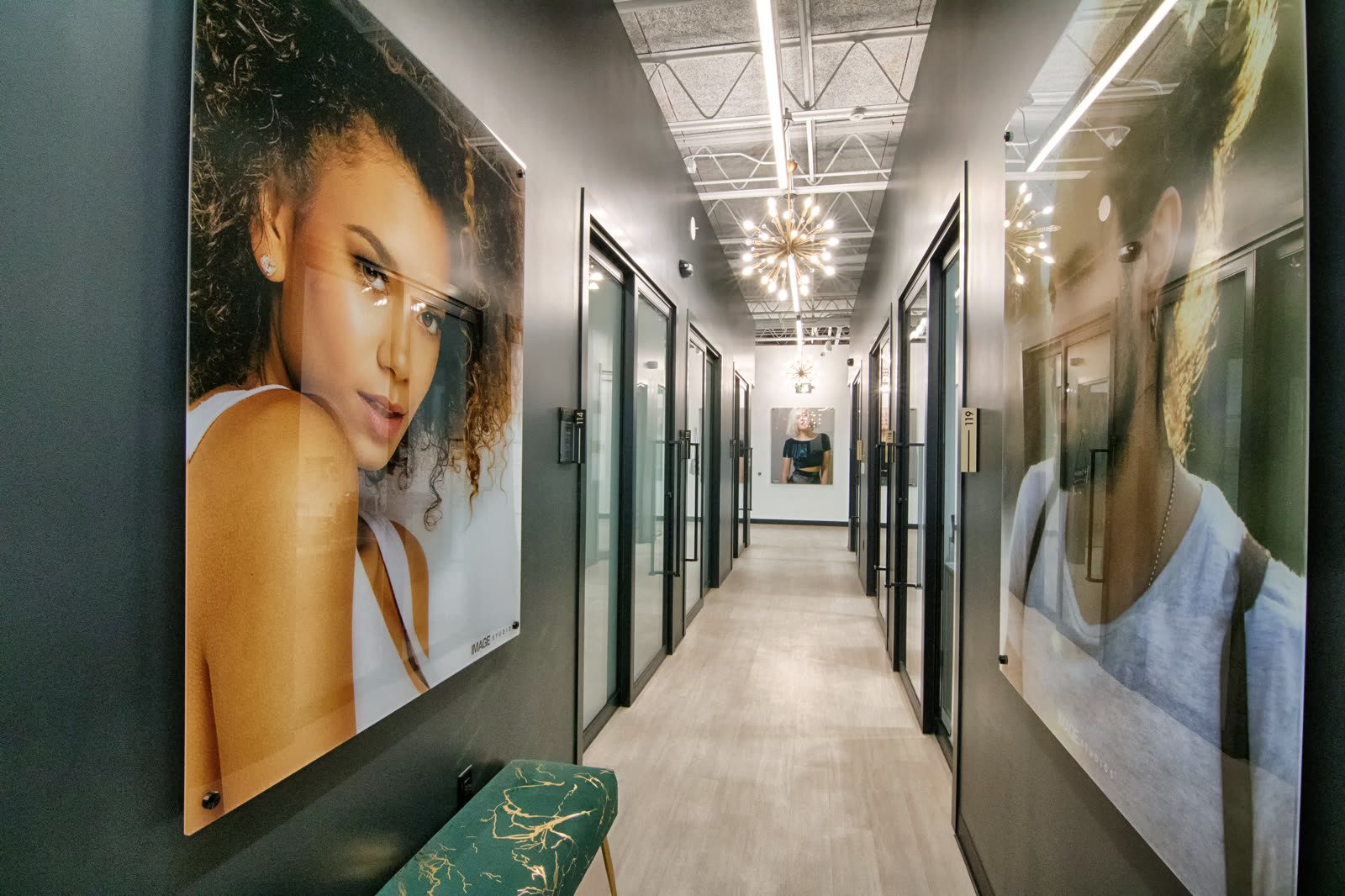 Contemporary office hallway with framed images